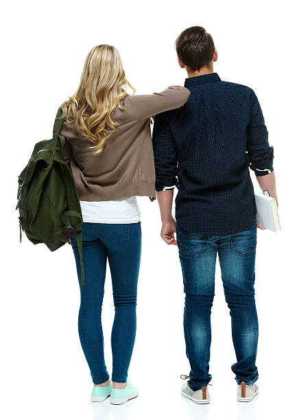 istock Rear view of two students standing together 505070924