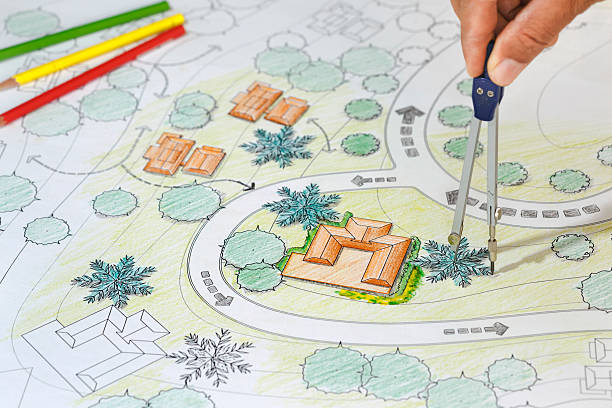 istock Landscape Architect Designs Blueprints For Resort. 505071066