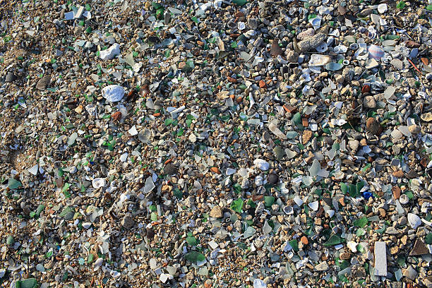istock pieces of sand stone and broken glass 505079067