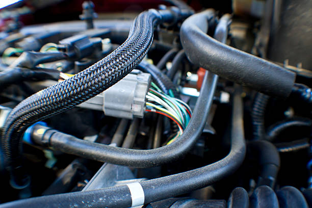 Engine hoses Close up of a car engine, or any technical machine or computer. hose photos stock pictures, royalty-free photos & images
