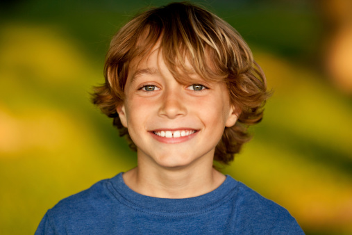 Portrait Of A Happy Young Boy