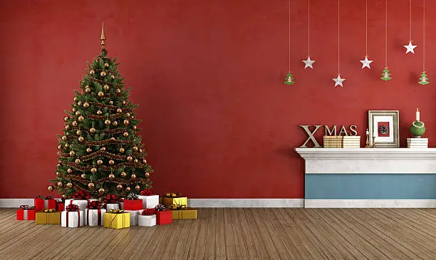 Photo of Old red room with christmas tree