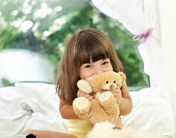 istock Happy Little Girl with Teddy Bear 505081977