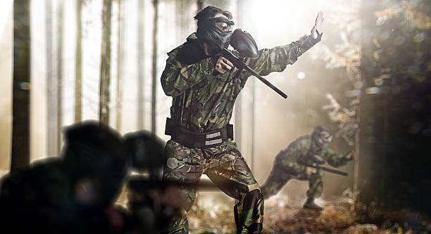 istock Paintball team in action 505084637