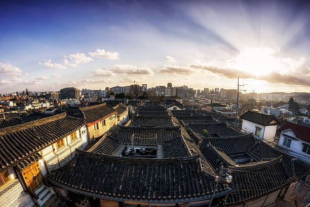 bukchon hanok village  taken at sunset in the famous bukchon observation cafe on top of the village. Bukchon hanok village is a famous tourist attraction in Seoul, South korea.