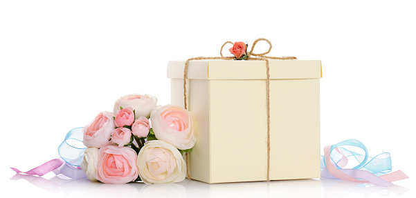 gift with floral decoration on white background