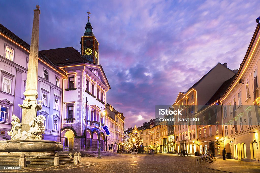 Ljubljana's city center, Slovenia, Europe. Romantic Ljubljana's city center, the capital of Slovenia, Europe. City hall and Roba's fountain shot at dusk. Architecture Stock Photo