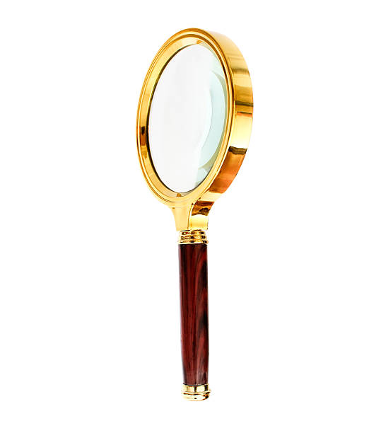 istock Small Gold Magnifying Glass Isolated on a White Background. 505087016