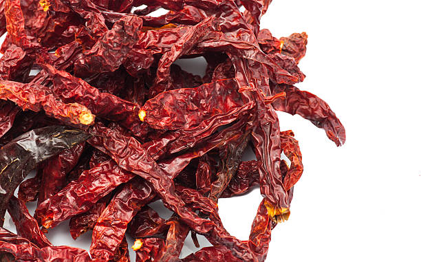 istock dried chili peppers on white background 505090206