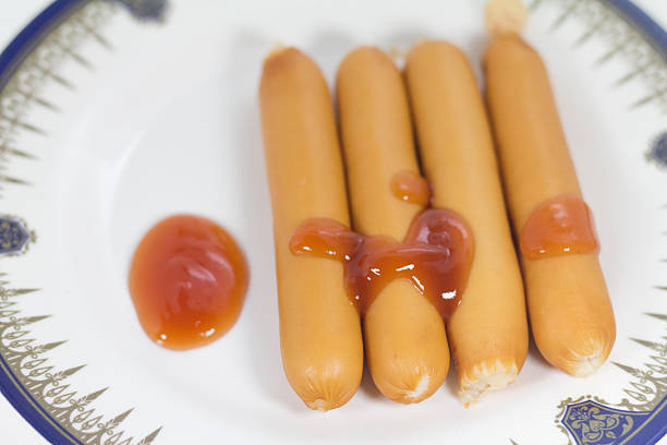 istock chicken sausages with tomato sauce 505090842