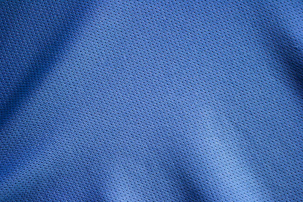 fond de texture de tissu des vêtements de sport - jersey en matière textile photos et images de collection