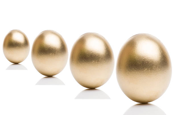 istock Golden eggs from  isolated on a white background. 505092702