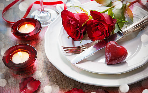 Place setting for Valentines day Festive place setting for Valentines day candle light dinner stock pictures, royalty-free photos & images