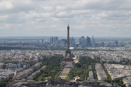 The photo is taken from the roof of a high-rise building in Paris.