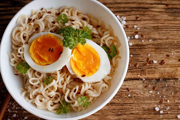 istock Chinese soup with eggs and parsley 505095962