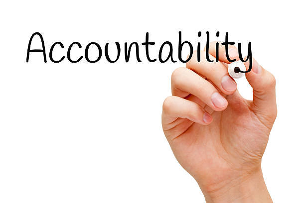 Accountability Black Marker Hand writing Accountability with black marker on transparent wipe board. responsibility stock pictures, royalty-free photos & images