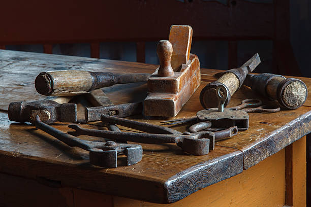 Still life in a rustic style: set of old joinery tools on a wooden table