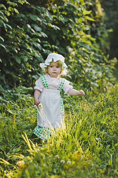 istock Child walks in the summer garden 505100118