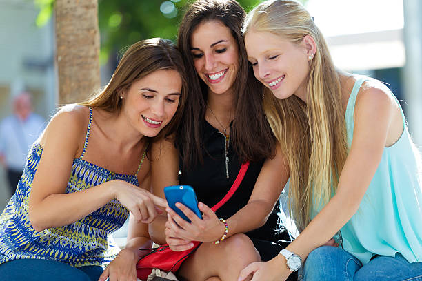 istock Group of friends having fun with smartphones. 505114355
