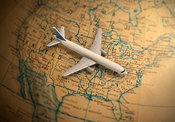 istock Globetrotting toy jet airliner vacation 505115683