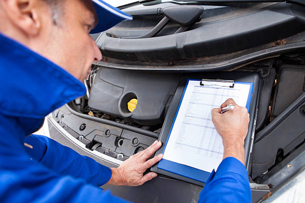 istock Mechanic Maintaining Car Records 505116017