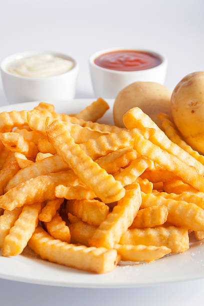 istock French Fries And Fresh Potatoes 505123330