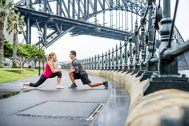 istock Stretching before daily workout under Sydney Harbour Bridge 505123540