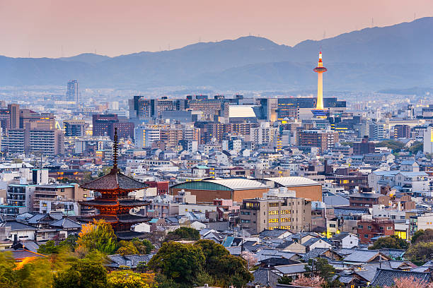 Kyoto, Japan Skyline at Dusk Kyoto, Japan skyline at dusk. kyoto city photos stock pictures, royalty-free photos & images