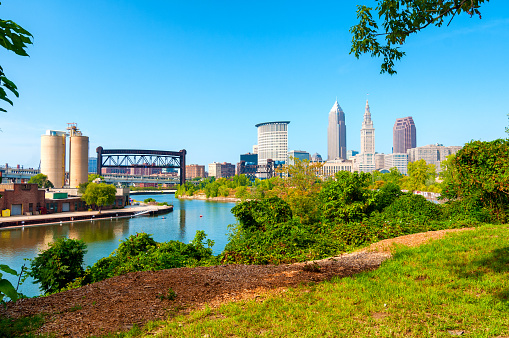 View of downtown Cleveland, Ohio, and the Cuyahoga River from a park on the west bank of the river