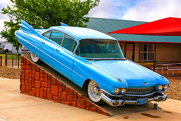 1959 Cadillac outside the Cadillac RV ranch in Amarillo Texas Amarillo, TX, USA - June 16th, 2015: 1959 powder blue Cadillac car outside the Cadillac RV ranch in Amarillo Texas 1950 1959 stock pictures, royalty-free photos & images