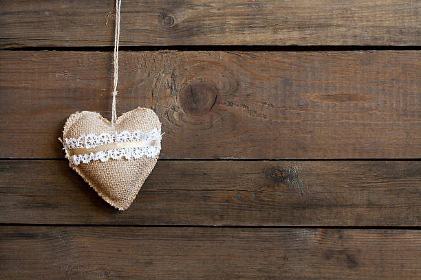 istock Handmade Valentines day heart on wooden table 505128200