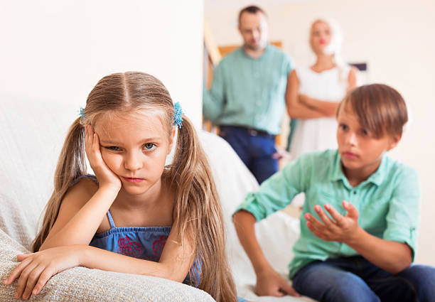istock Brother calms angry sister 505128208