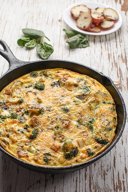 istock Baked egg frittata on weathered white wood 505133272