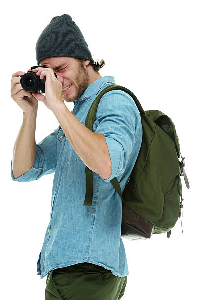 istock Photographer in action with camera 505134286