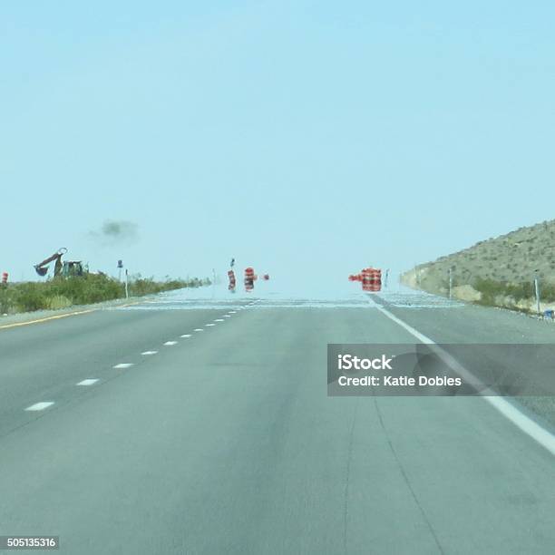 Heat Wave Water Mirage Illusion On Highway Road Nevada Desert Stock Photo - Download Image Now