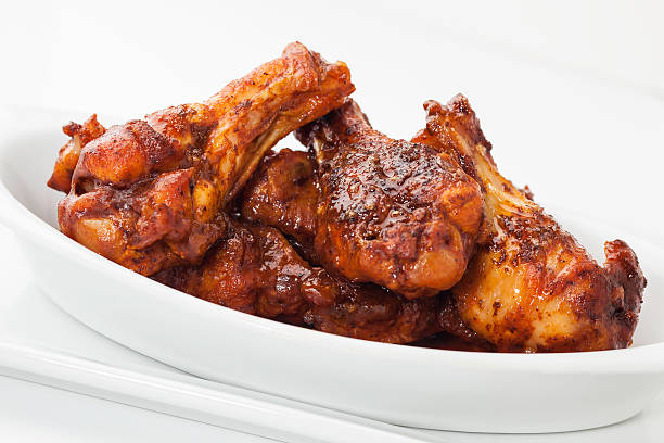 istock Bowl of chicken wings isolated on white 505135510
