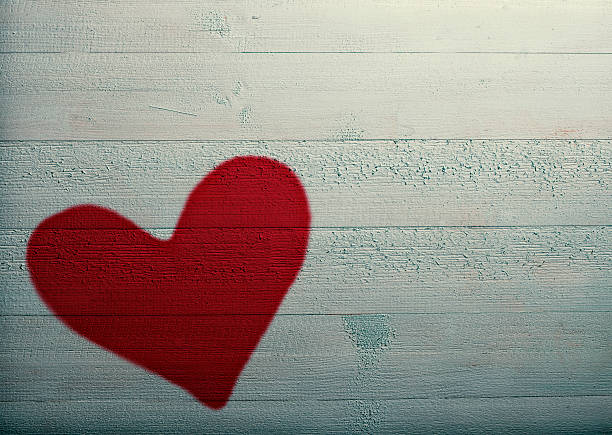 istock Red heart on the old board 505136630
