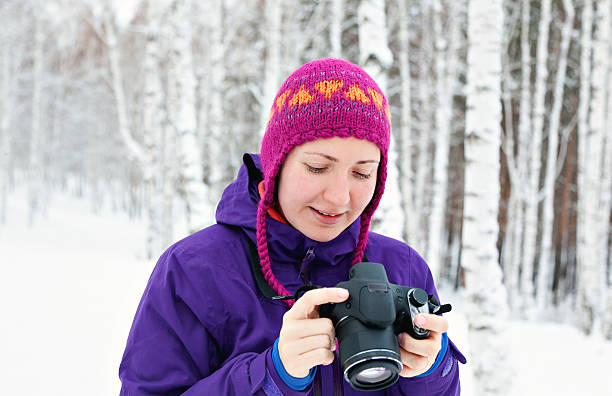 istock girl with camera outdoors 505137504