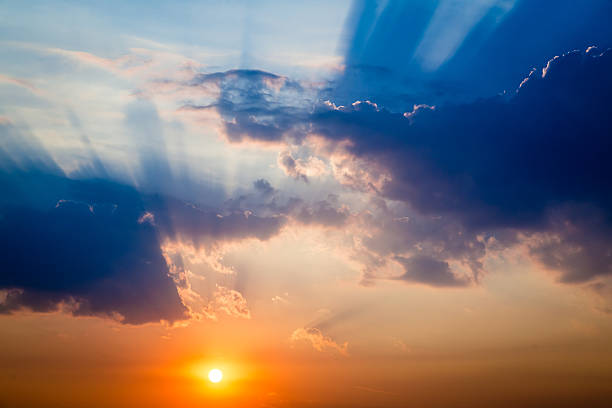 istock Sunset over clouds with blue and orange colors as background 505138396
