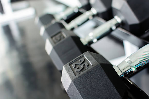 istock rows of dumbbells on a rack in a gym 505141999