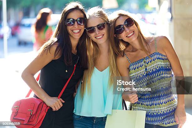 Group Of Beautiful Young Girls In The Street Shopping Day Stock Photo - Download Image Now