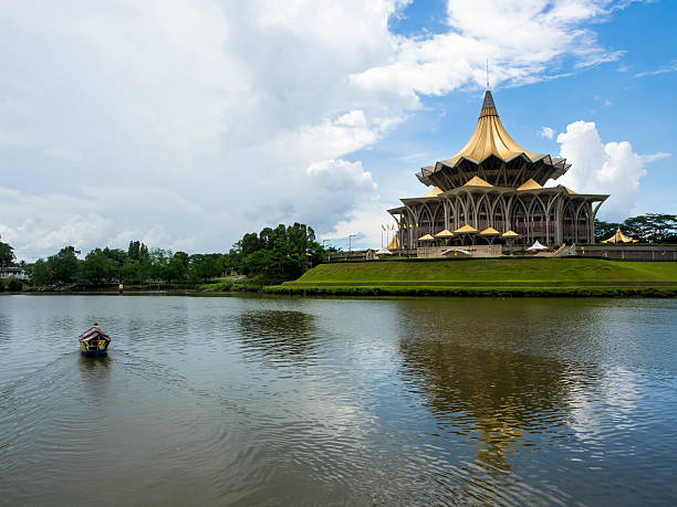 Architectural Landmark in Kuching, Sarawak, Malaysia The iconic New Sarawak State Legislative Assembly building (Dewan Undangan Negeri) by the waterfront in Kuching, Sarawak, Malaysia. kuching waterfront stock pictures, royalty-free photos & images