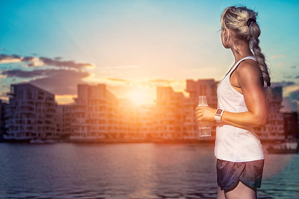 young man running at sunset