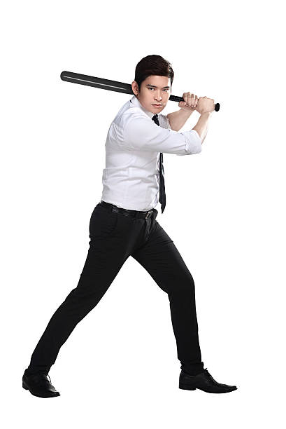 istock Young business man holding baseball bat 505159152