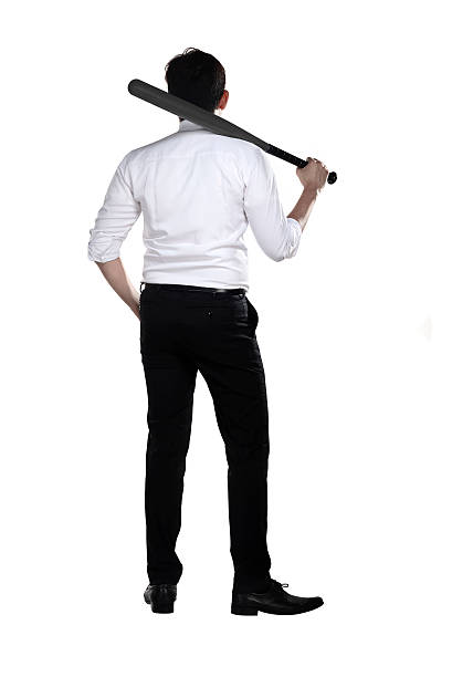 istock Young business man holding baseball bat 505159176