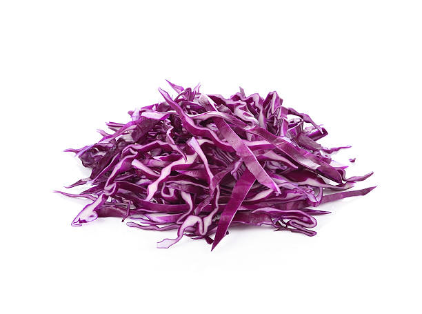 istock pile of cut red cabbage over white background 505162910