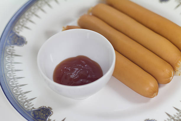 istock chicken sausages with tomato sauce 505164852