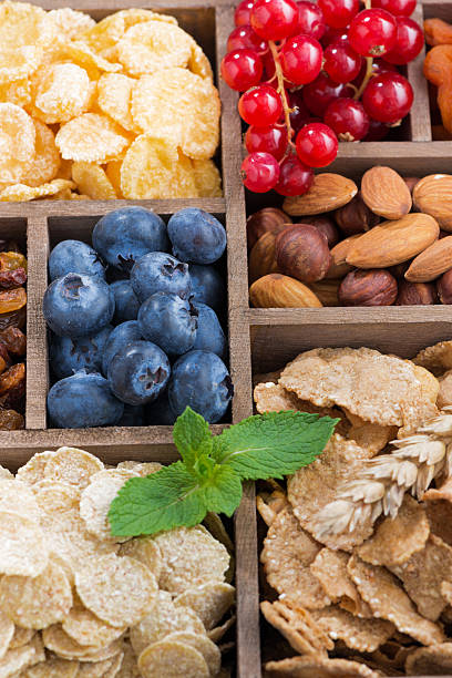 istock breakfast cereal and other ingredients in wooden box, top view 505167964