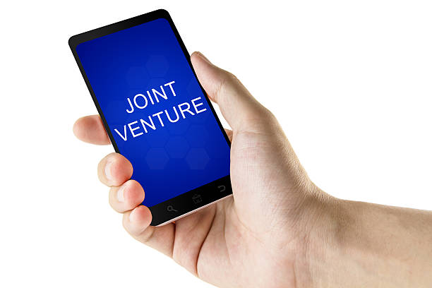 istock joint venture word on digital smart phone 505167982