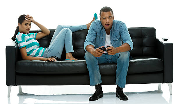 istock Bored couple sitting on couch 505168400